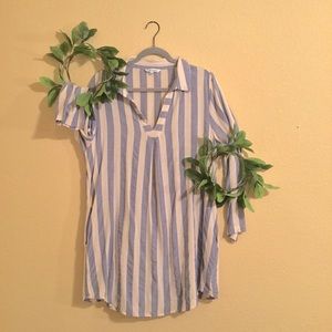 Thin, lightweight long top. Great holiday top with leggings and boots.